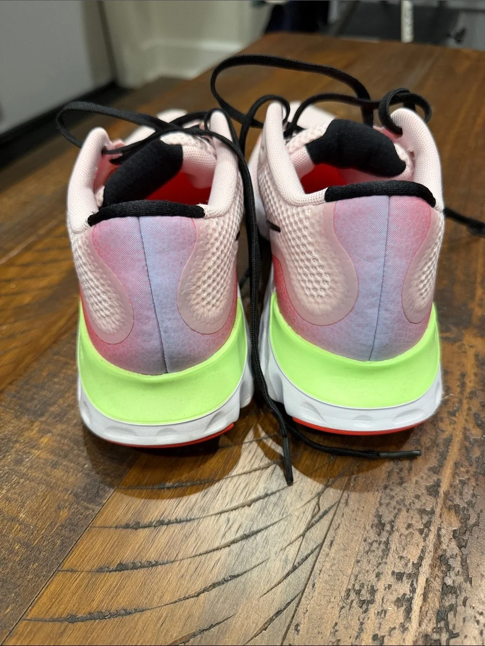 Nike Pink Mesh Running Sneakers with Black Swoosh and Neon Accents